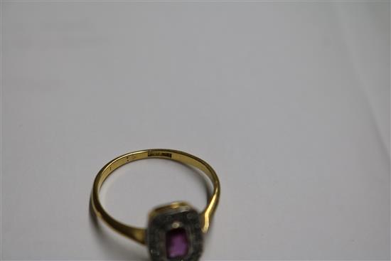 A 1920s/1930s 18ct gold and platinum ruby and diamond tablet ring, size M.